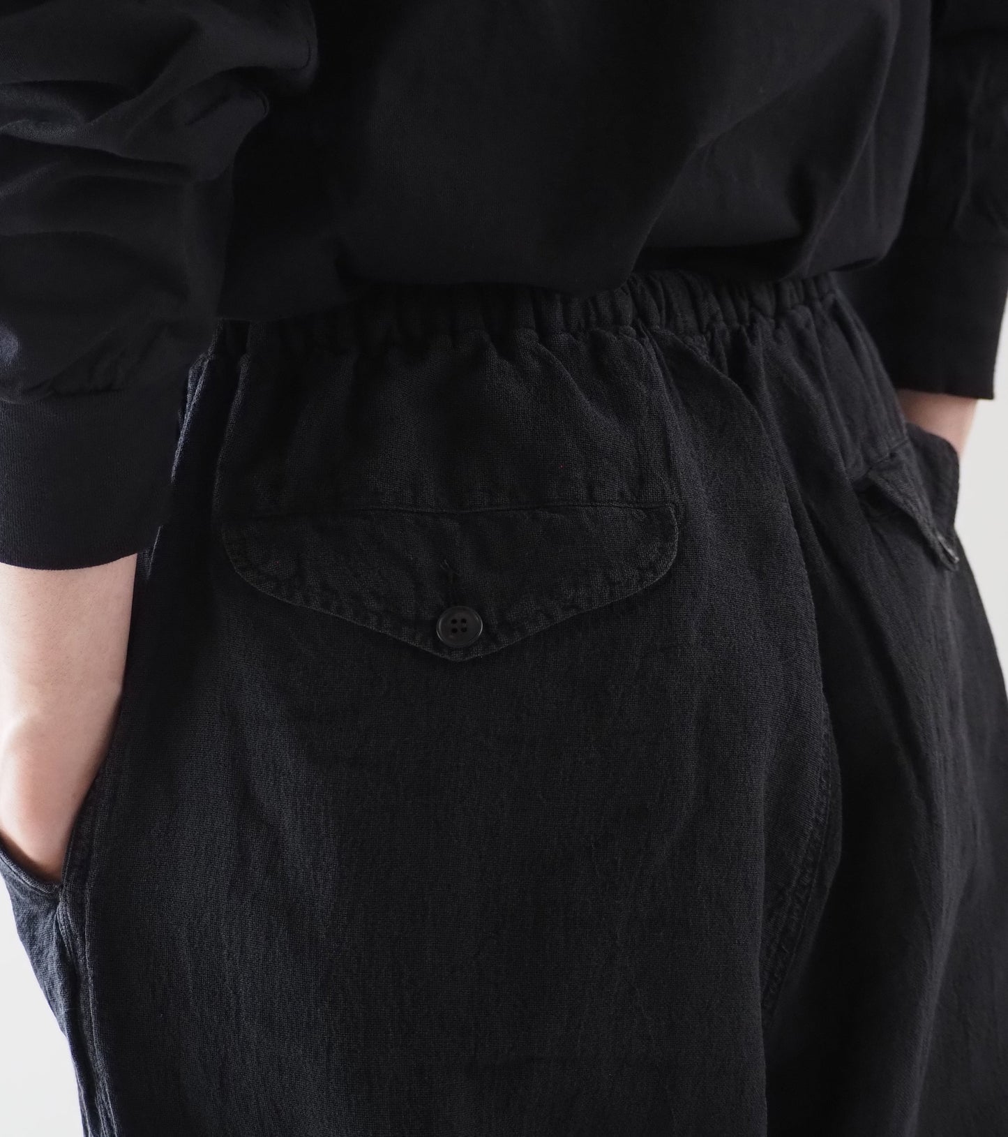 COMOLI Faded Black Knee Tuck Pants