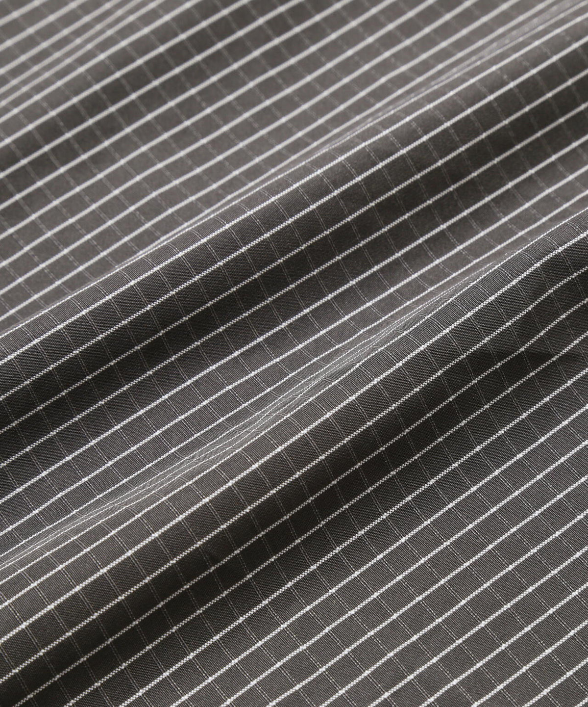 and wander x Brompton reflective rip hoodie