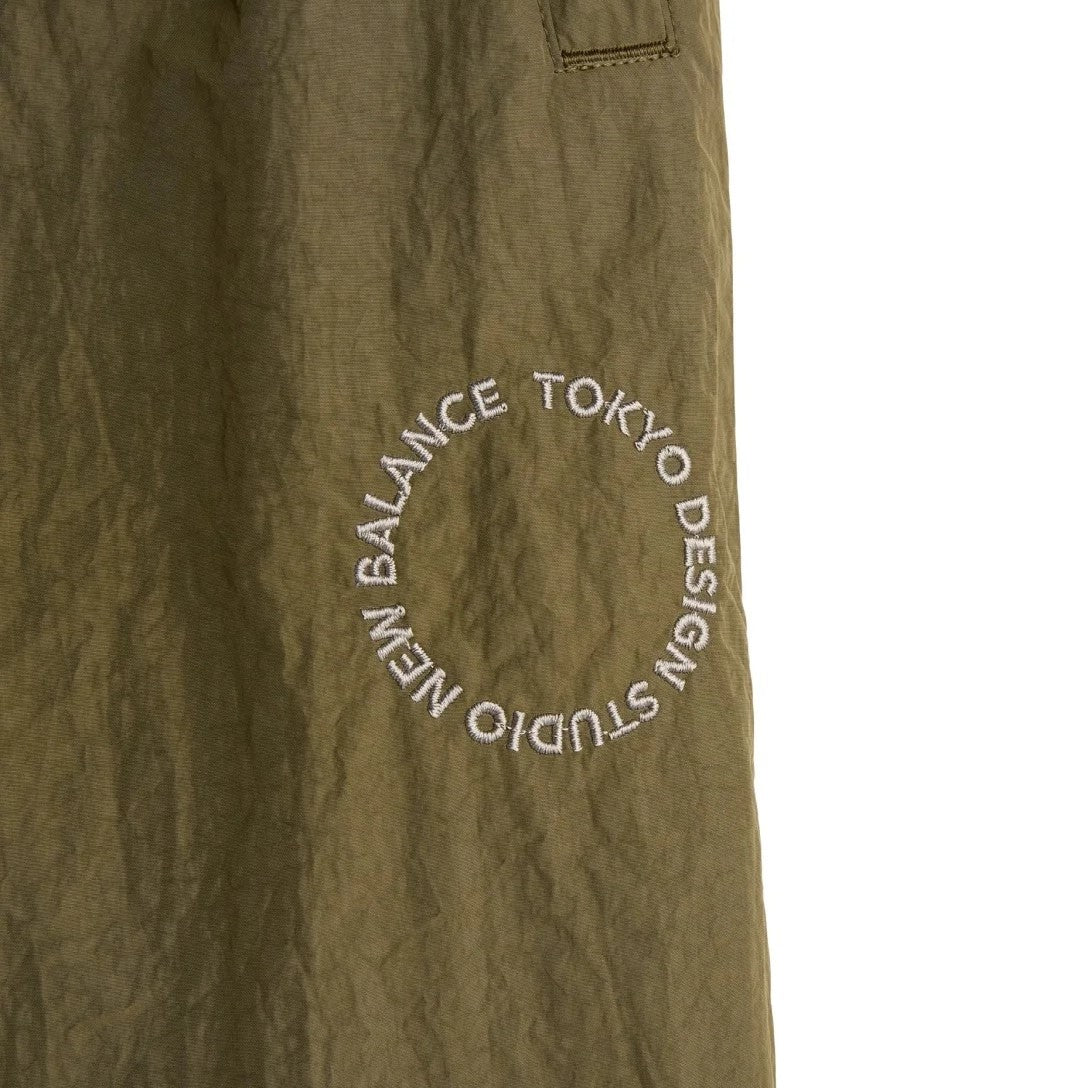 TOKYO DESIGN STUDIO New Balance Nylon Wind Pants - OLIVE