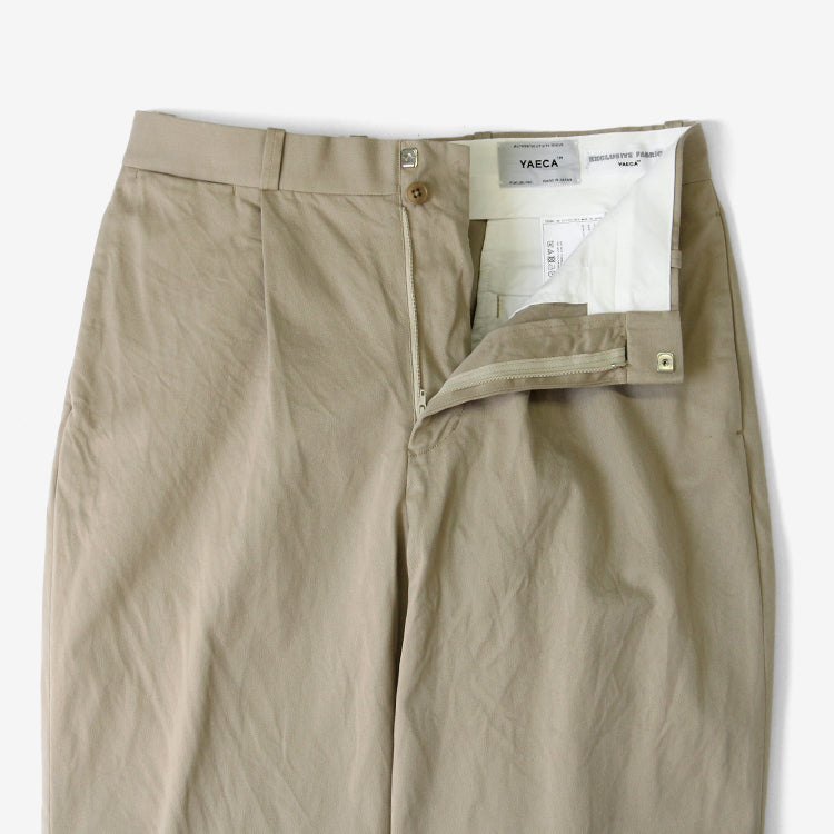 YAECA TUCK TAPERED CHINO TROUSERS