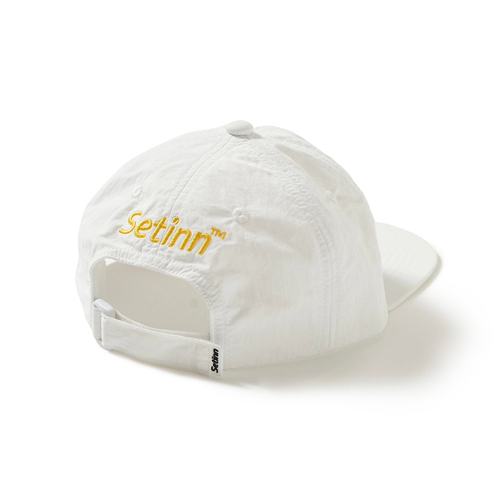 Setinn C. Strings Cap