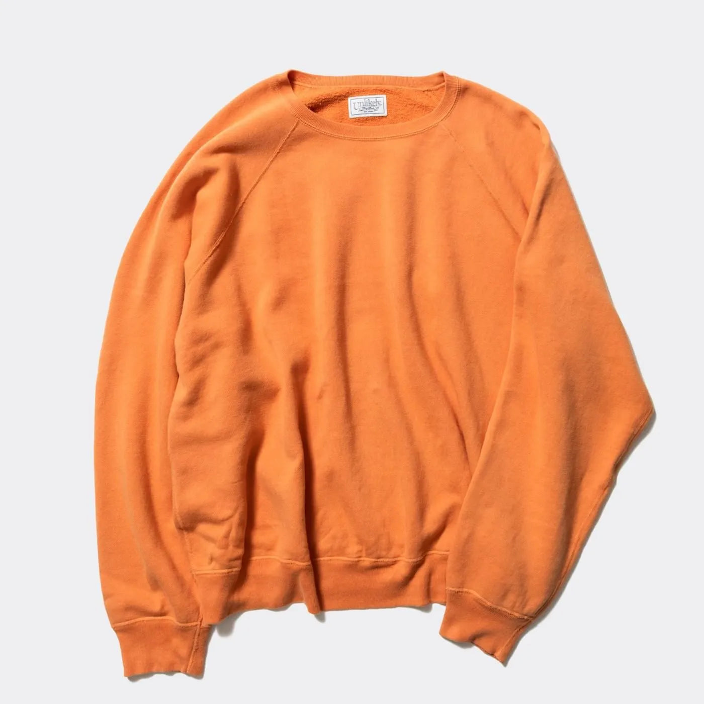 Unlikely Raglan Sleeve Crew