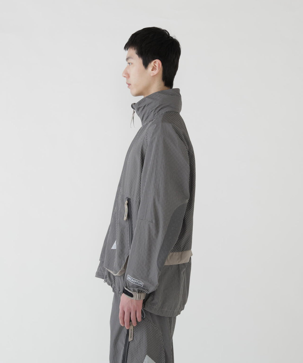 and wander x Brompton reflective rip hoodie