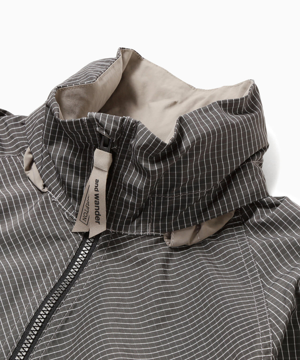and wander x Brompton reflective rip hoodie