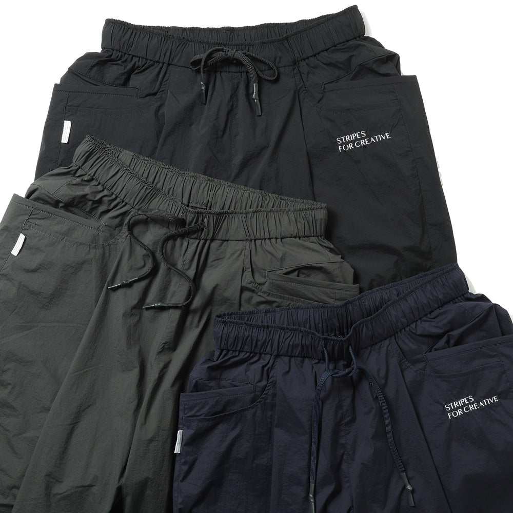 S.F.C (STRIPES FOR CREATIVE) WIDE TAPERED EASY PANTS (NYLON)