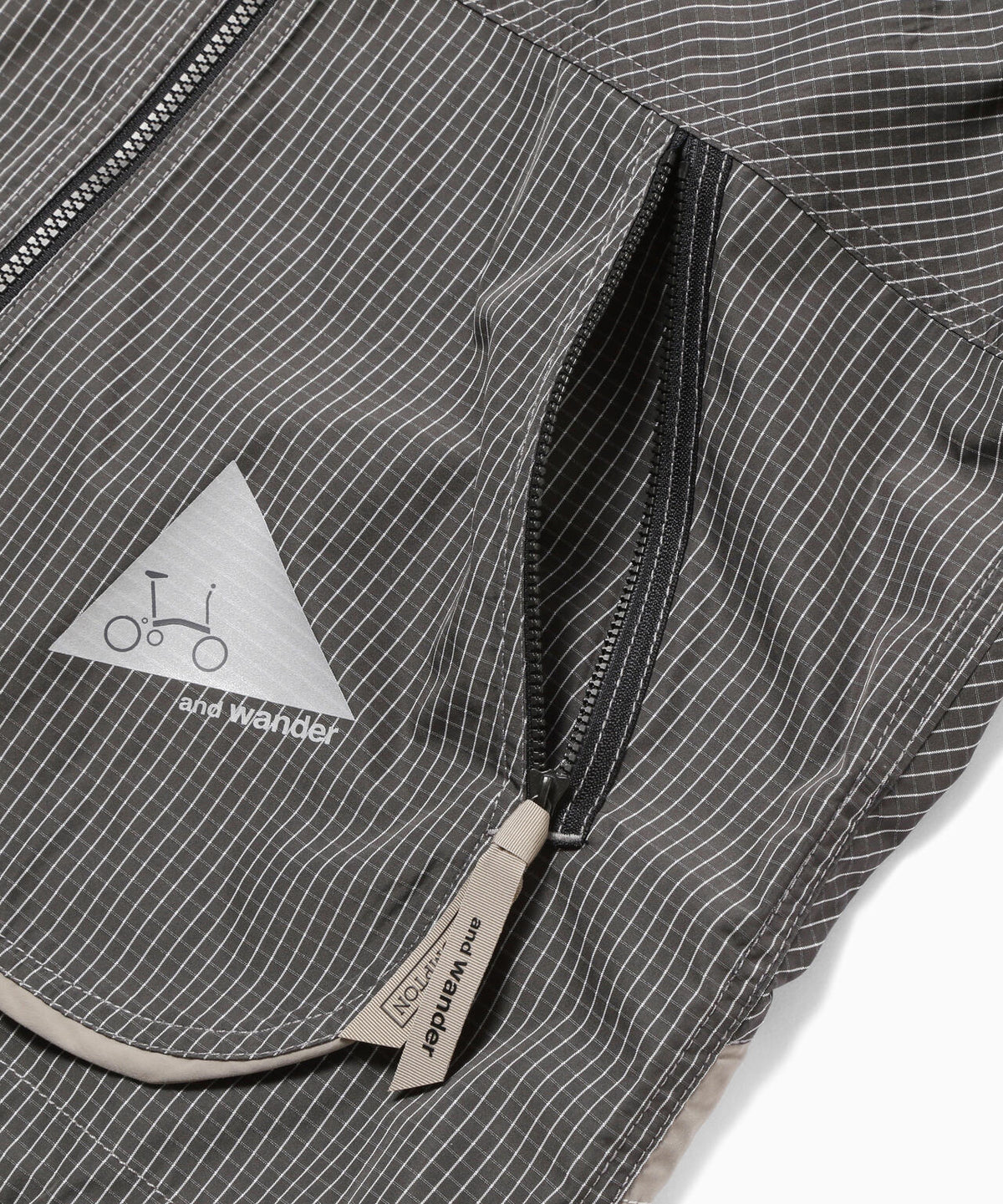 and wander x Brompton reflective rip hoodie