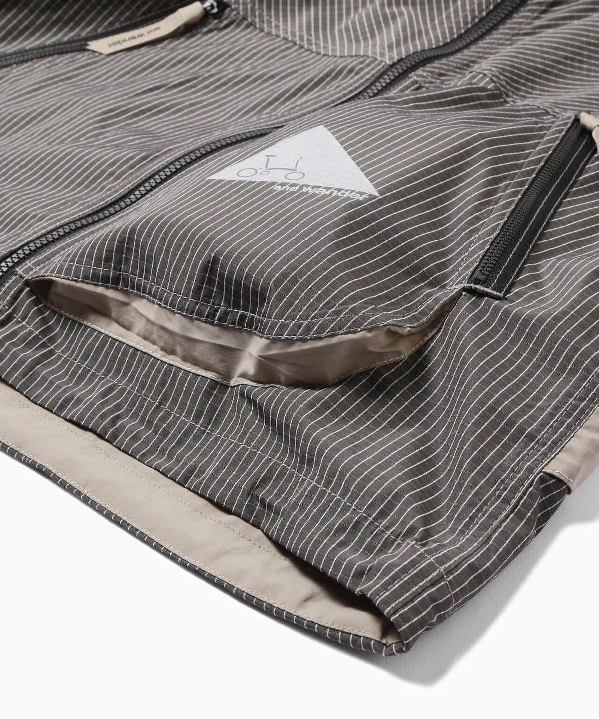 and wander x Brompton reflective rip hoodie